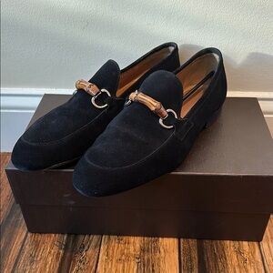Men’s black Gucci suede loafer